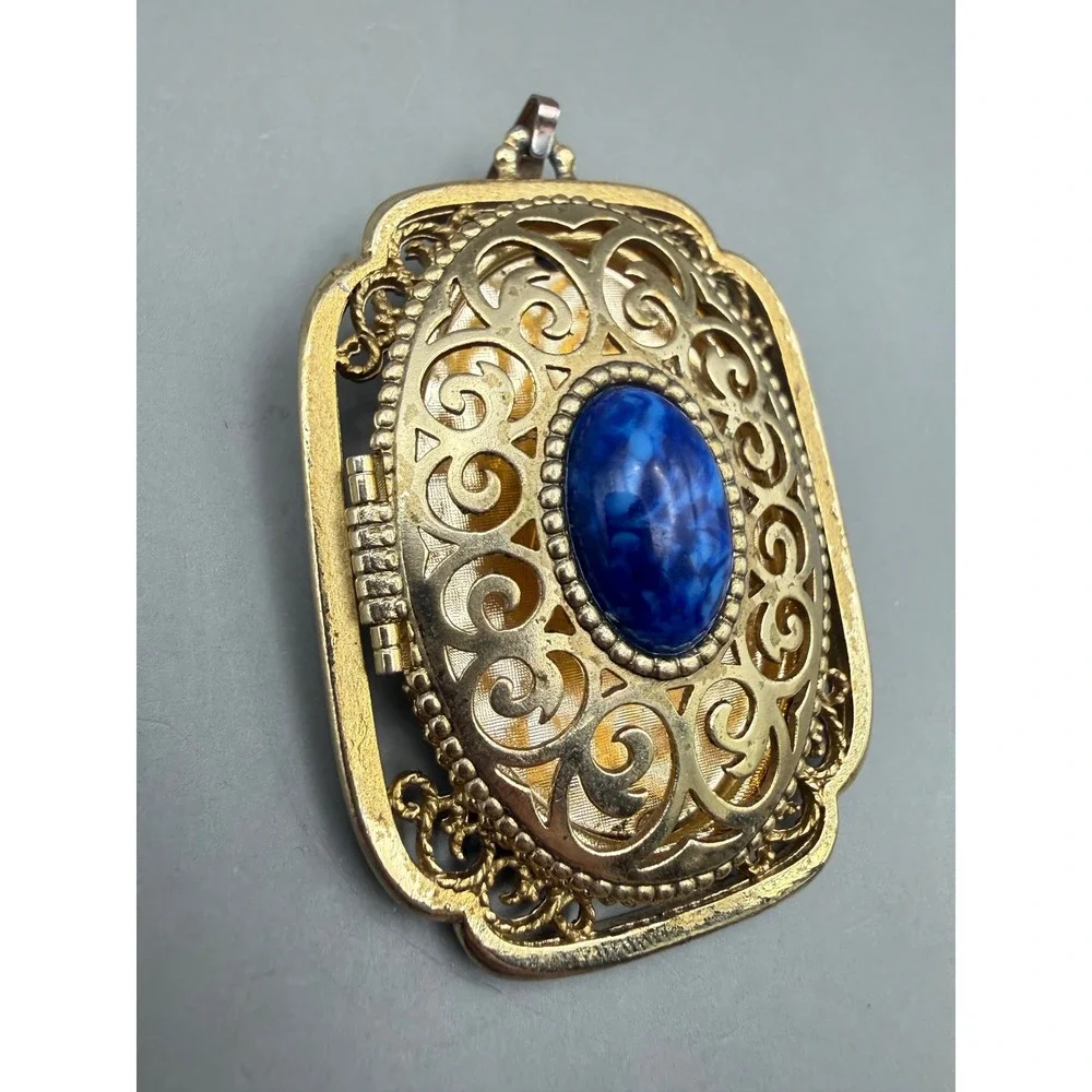 Avon Locket Pendant Blue Faux Lapis Cabochon Gold Tone Filigree Scroll Rectangle